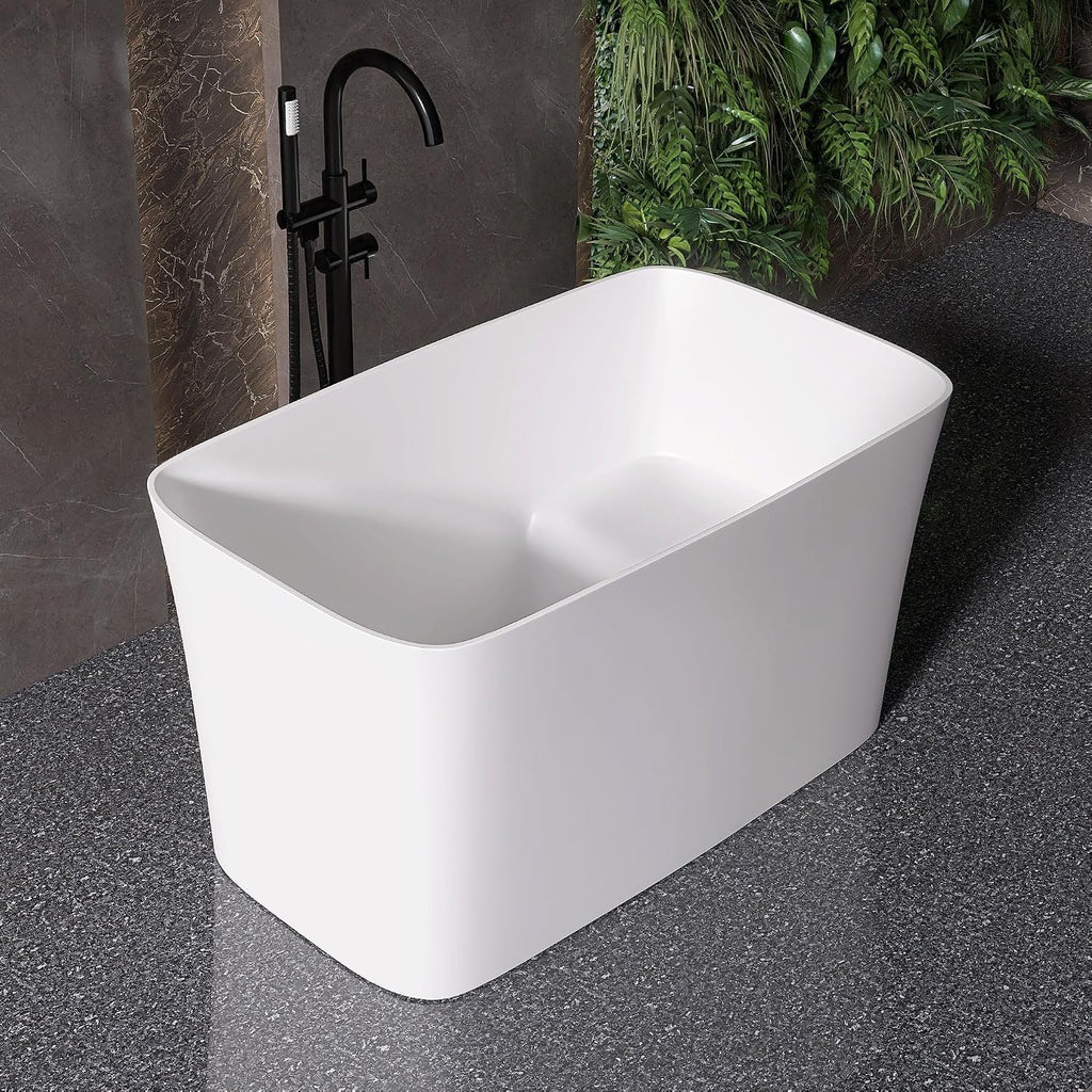 47' Stone Resin Freestanding Bathtub, Freestanding Bathtub with seat,Oval Solid Surface Japanese Soaking Bathtubs with Drain & Integrated Slotted Overflow Matte White MG003-1200